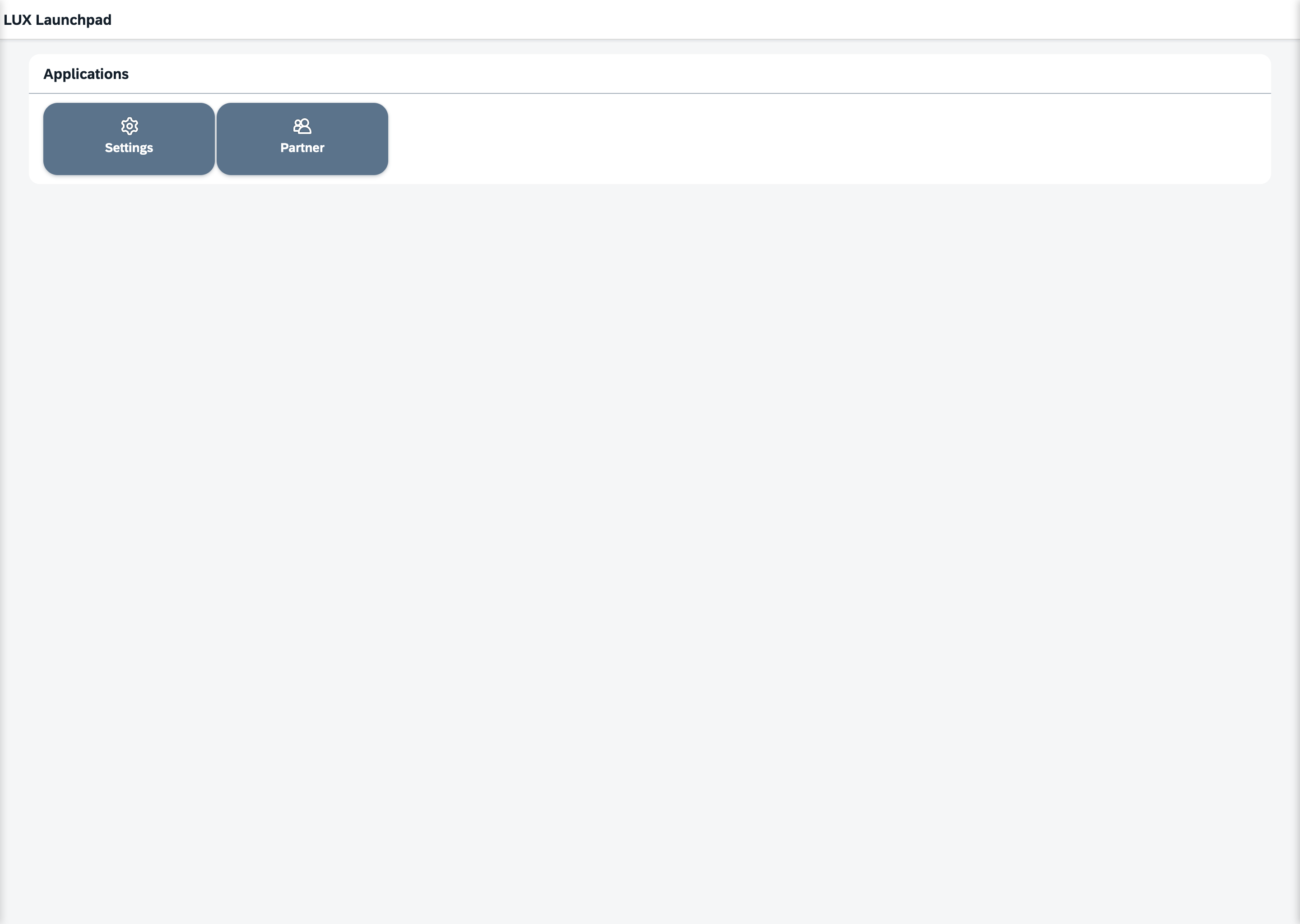 The LUX Launchpad of a host that ships two apps: one Applications group with a tile each for Settings and Partners.